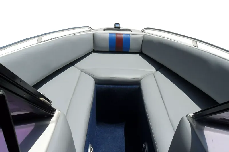 Boat bow seating upholstered in grey and blue marine vinyl